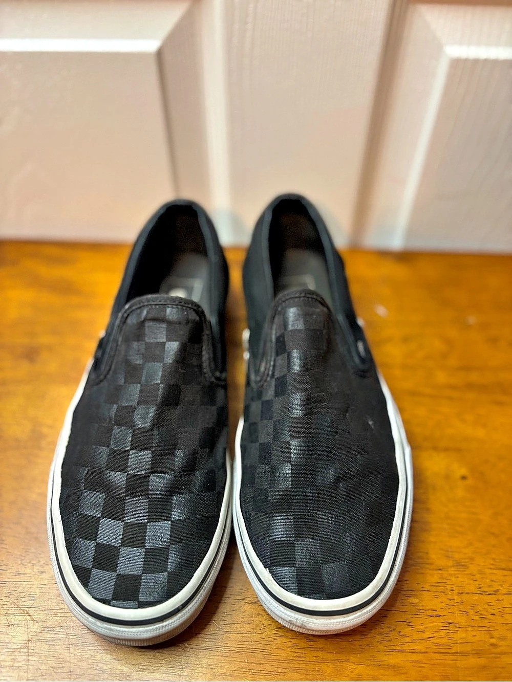 Vans Classic Slip-On Checkered Slip-On Sneakers in Black & White w9.5/m7.5